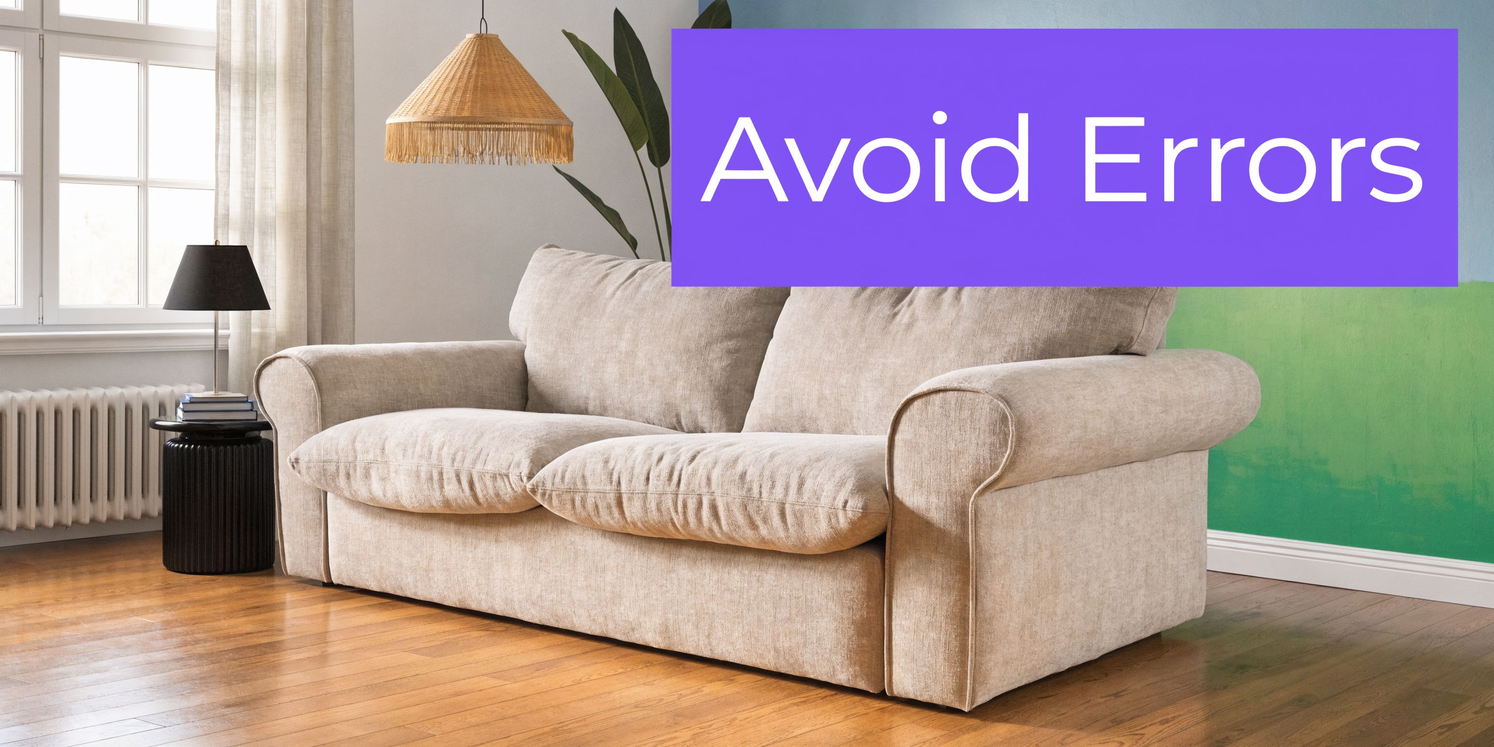 A cozy beige sofa in a brightly lit modern living room with a houseplant and table lamp.