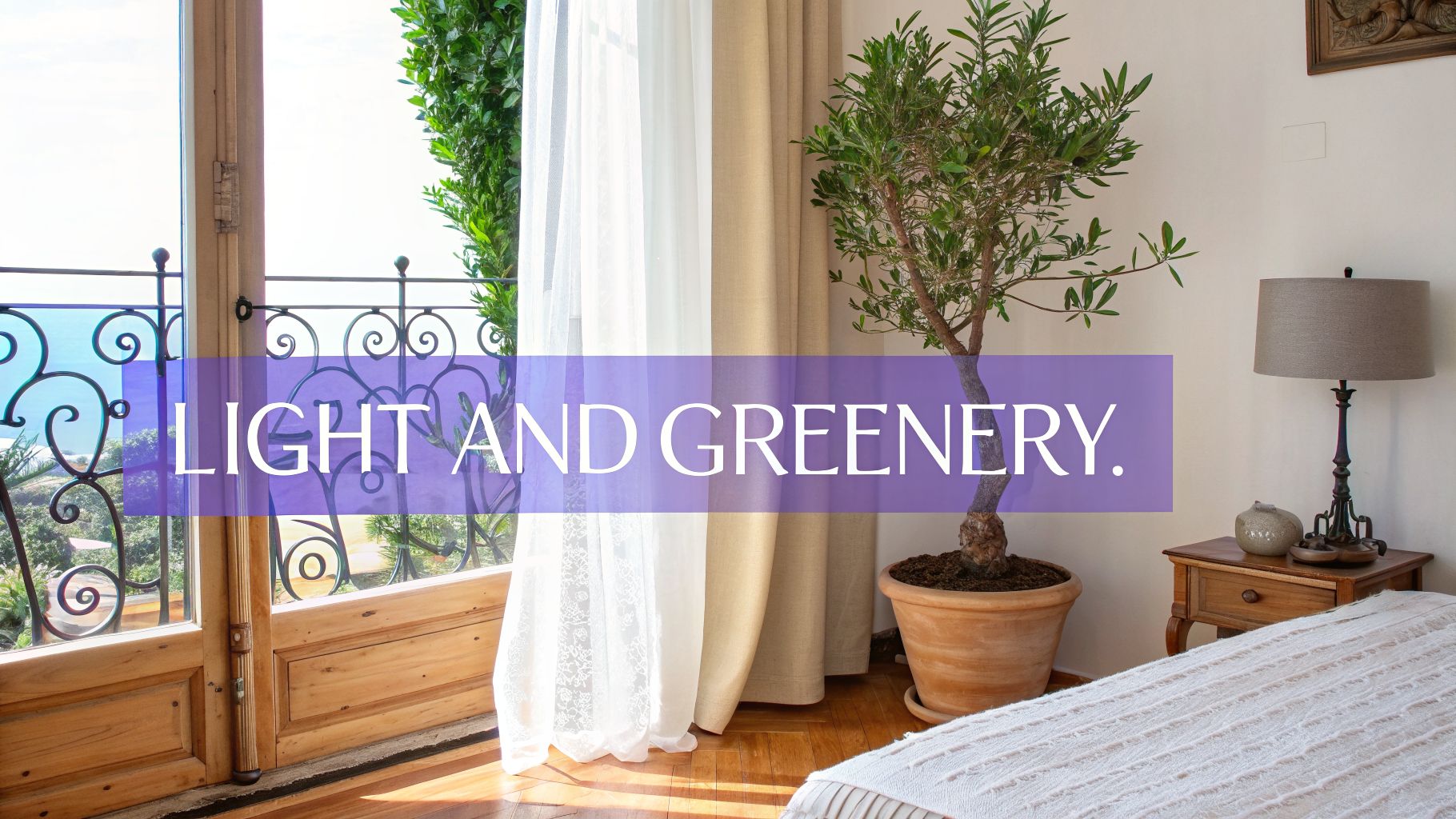 A sunny Mediterranean-style bedroom featuring an olive tree, open balcony, and a comfortable bed.