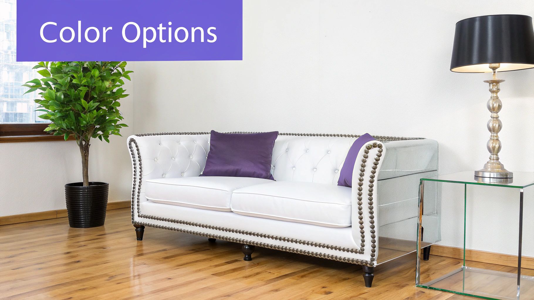 A luxurious white tufted sofa with purple throw pillows in a beautifully staged living room.