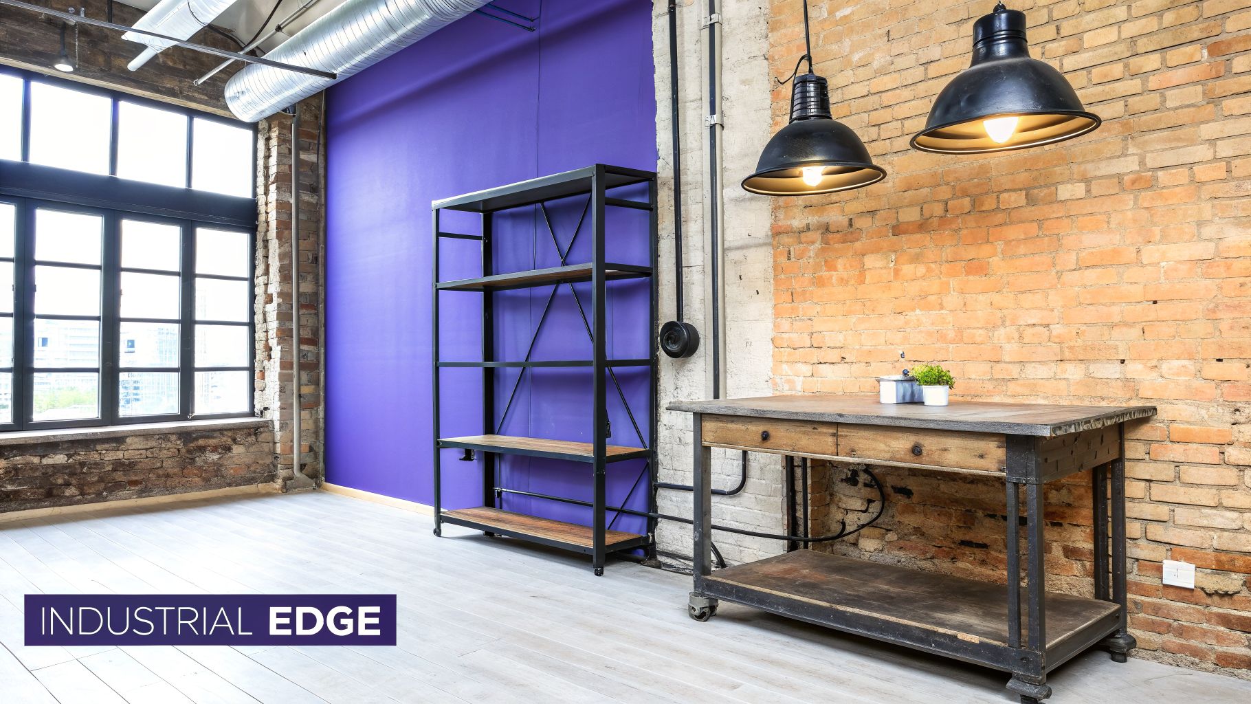 An industrial-style room featuring exposed brick, a purple accent wall, metal and wood furniture, and large windows.